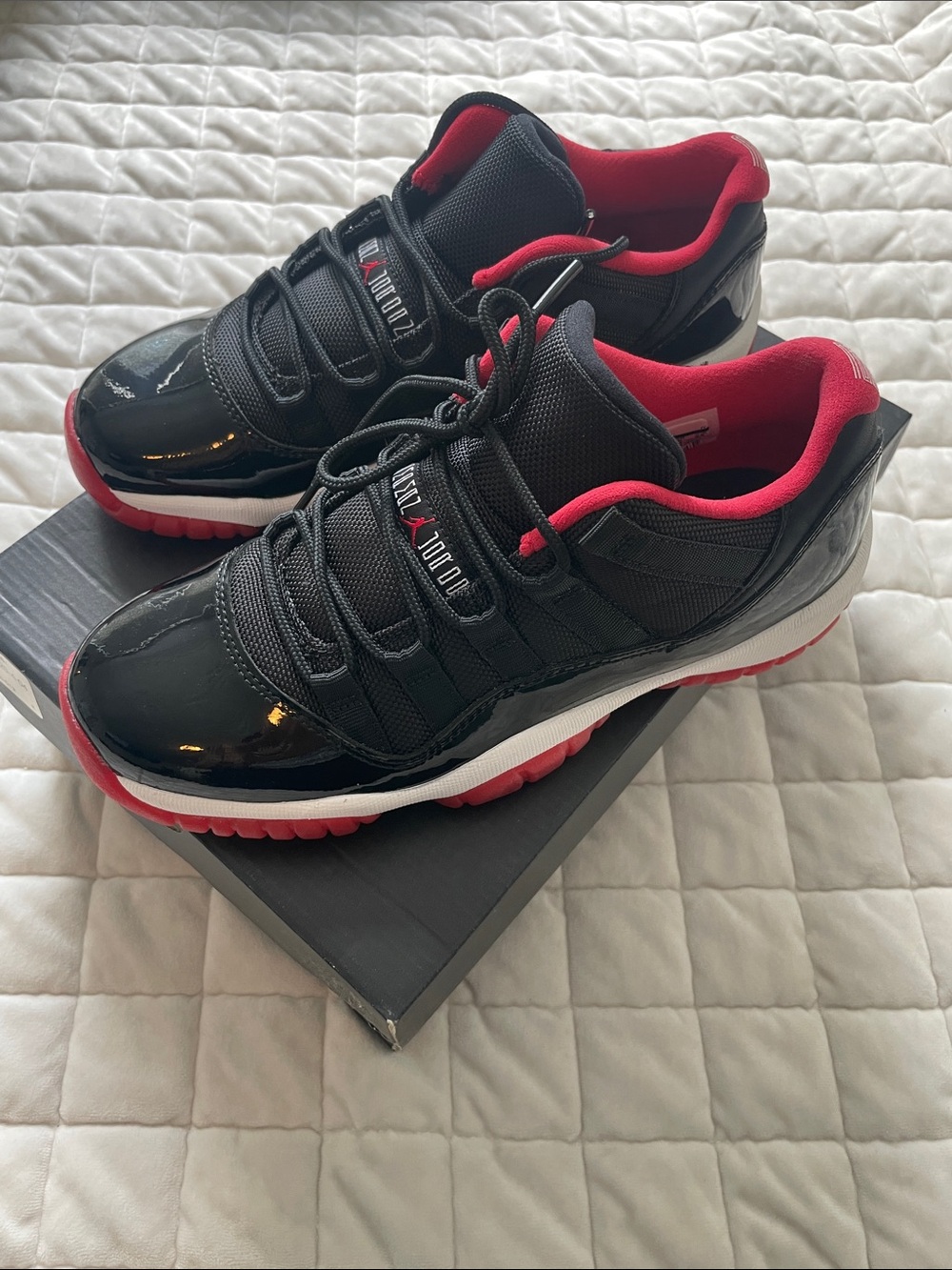 Jordan Black and Red Air Jordan 11 Retro Low Bred